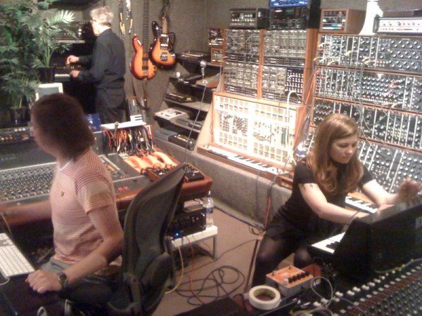 Composers Tara Busch & Benge Edwards working together in the studio with John Foxx.